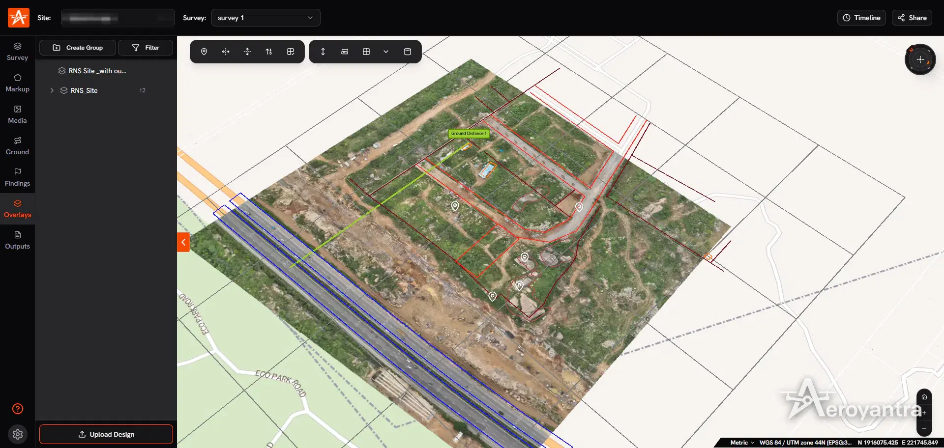 Land parcel drone orthomosaic with CAD plot boundaries and road alignment overlaid in the Aeroyantra platform